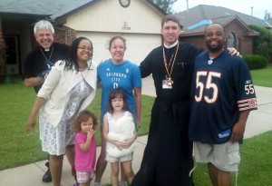 IOCC Frontliners, Fr. Jon-Stephen Hedges (l) and Fr. David Hostetler (r) in Moore, Oklahoma, with tornado survivors. (Photo: Dan Christopulos/IOCC)